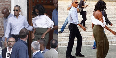 Bà Obama sánh bước cùng chồng trong bộ cánh khoe trọn bờ vai