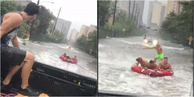 Siêu bão Harvey đi qua, 4 thanh niên vô tư lướt sóng ngay trên đường bị ngập