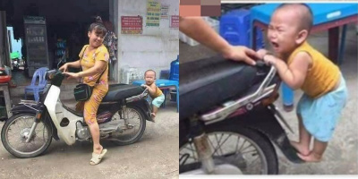 Ai trong chúng ta cũng bồi hồi nhớ về tuổi thơ khi xem bức ảnh cậu bé "bám đuôi" mẹ đi chợ này