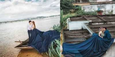 Bất chấp nước lũ dâng cao, cặp đôi tại Ninh Bình "bay thẳng" lên nóc nhà để chụp ảnh cưới