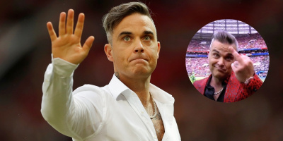 Hé lộ nguyên nhân đằng sau hành động giơ "ngón tay thối" của nam ca sĩ Robbie Williams