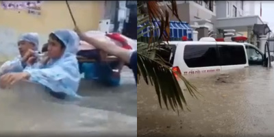 Clip xúc động sau bão số 9: Nhân viên y tế khiêng cáng bệnh nhân đi trong dòng nước cao ngang người