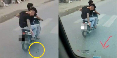 Hà Nội: Hãi hùng cảnh 2 nam thanh niên đầu trần đánh võng, rải đinh trước bánh xe ô tô
