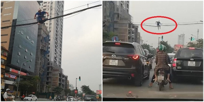 Hình ảnh "người nhện" đu dây điện tránh tắc đường giữa thủ đô Hà Nội "gây bão" trên báo nước ngoài