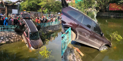 Hà Nội: Tài xế ôtô 7 chỗ tông sập dải phân cách đường Thanh Niên, cắm đầu xuống hồ Trúc Bạch