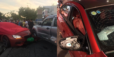 Chủ xe sang lấy vải đỏ che xe rồi biến mất sau khi tông sập dải phân cách, lao vào xe máy ô tô ở SG