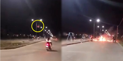 Chiếc xe máy bị đèn trời rơi trúng cháy ngùn ngụt như ngọn đuốc