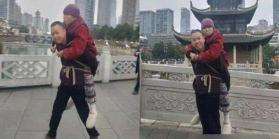 Xúc động trước câu chuyện người đàn ông dùng dây buộc mẹ già trên lưng