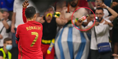 Ronaldo bị CĐV ném hẳn chai Coca vào người "cà khịa"