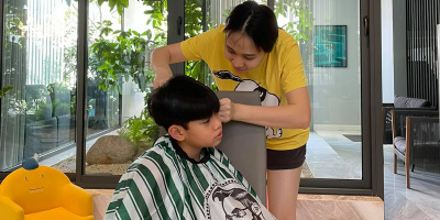 Đàm Thu Trang ân cần cắt tóc cho Subeo mùa dịch