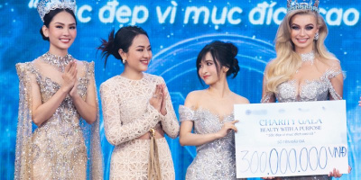 Vợ chồng đại gia Minh Nhựa đấu giá thành công 2 mẫu váy của MW và MWVN
