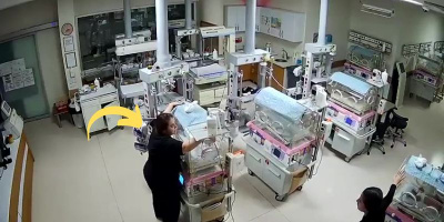 Mặc kệ động đất, nữ y tá vẫn ở lại giữ bình yên cho các em bé tại viện
