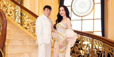 Hoa hậu Đoàn Hồng Trang sánh đôi cùng NTK Tommy Nguyễn tại sự kiện