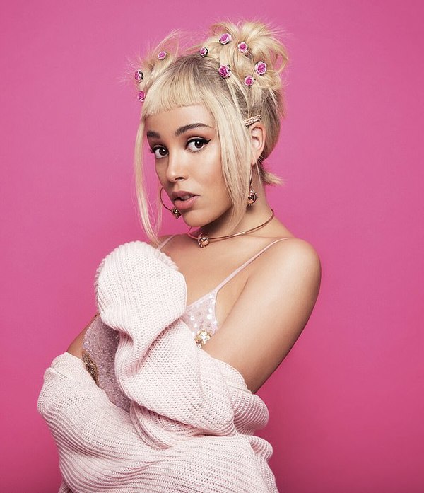 Rapper Doja Cat hits back at claims YouTube lightened her complexion in new  photo - ReadSector