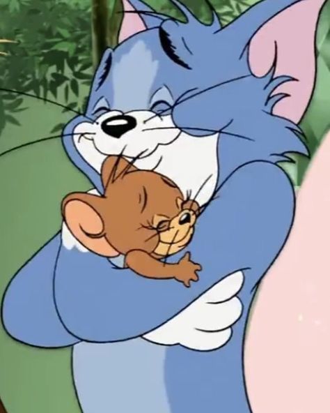  
Chú mèo Tom và chuột Jerry ôm nhau tình cảm. (Ảnh: Pinterest)
