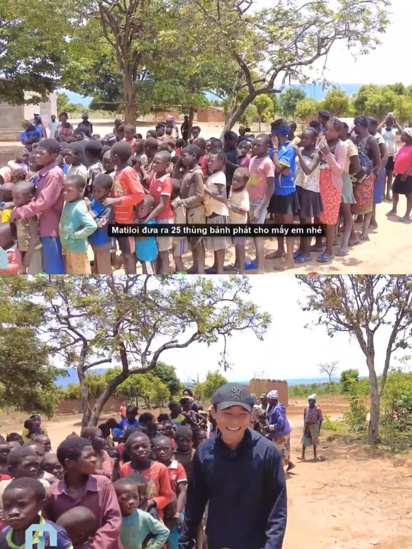 Mỗi lần Quang Linh đến, các trẻ em lại xếp hàng để được nhận bánh kẹo. (Ảnh: YouTube Quang Linh Vlogs)