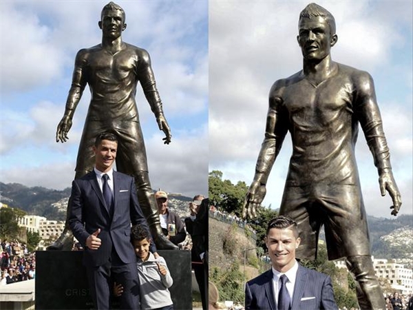 
Ronaldo bên tượng đài của mình ở Madeira.