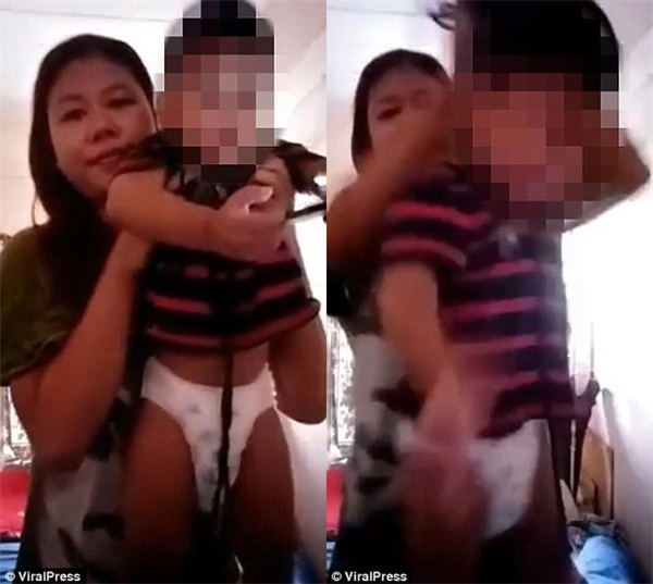 Người phụ nữ Thái Lan này đang dùng dây để hành hạ con trai mình.