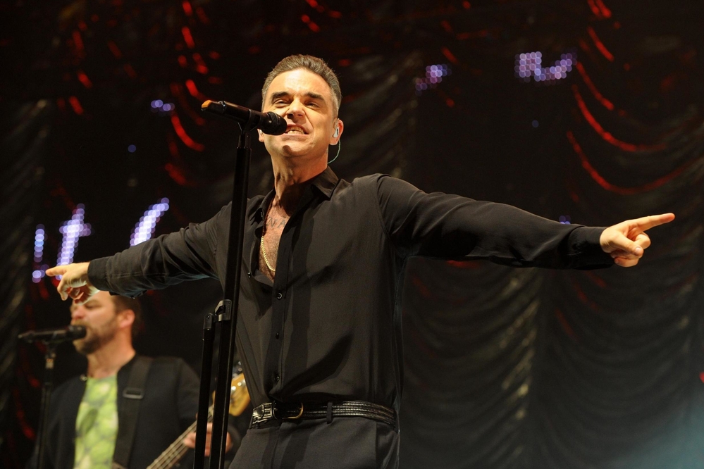 
Robbie Williams - một trong những biểu tượng nhạc Pop ở thập niên 90 là người "cầm trịch" chính tại buổi lễ khai mạc World Cup 2018.