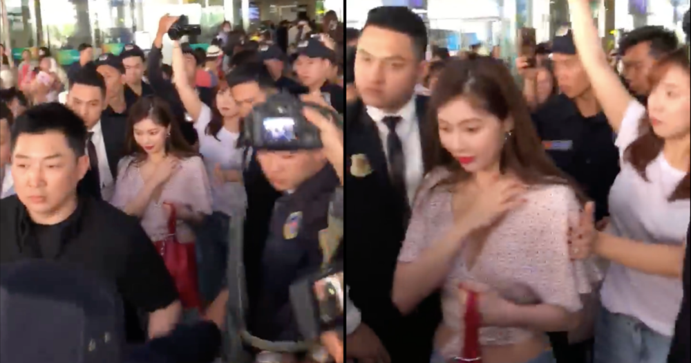 Ăn mặc quá gợi cảm, HyunA liên tục dùng tay che chắn vòng 1 khi xuất hiện tại sân bay Việt Nam