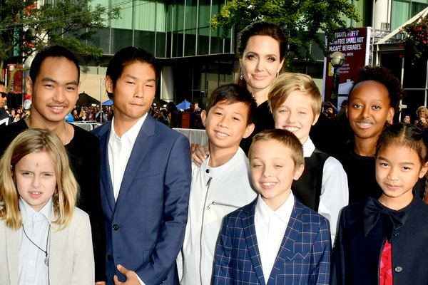 After the divorce: Angelina Jolie was completely shocked when her six children all wanted to live with their father Brad Pitt