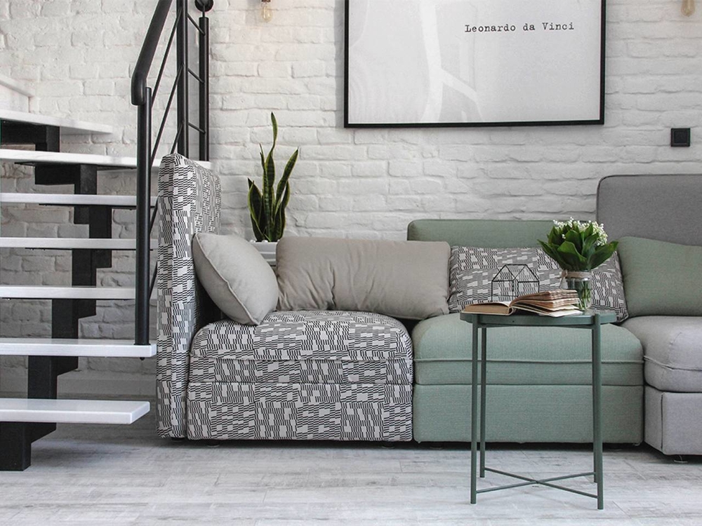 
Bộ sofa kết hợp tông pastel cùng họa tiết tạo điểm nhấn cho không gian trắng - đen