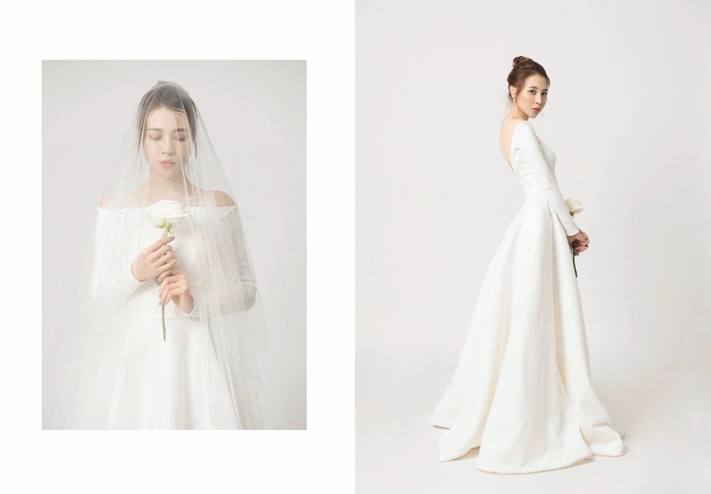  
Người đẹp họ Đàm khoe vẻ đẹp quyến rũ, dịu dàng với bộ váy màu trắng do NTK Lâm Lâm thiết kế.