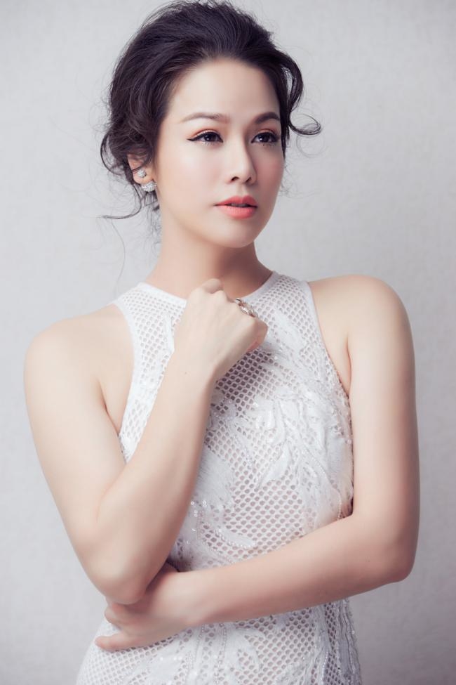  
Nữ ca sĩ Nhật Kim Anh lại có một cái tên rất mộc mạc là Đỗ Thị Kim Huê. - Tin sao Viet - Tin tuc sao Viet - Scandal sao Viet - Tin tuc cua Sao - Tin cua Sao