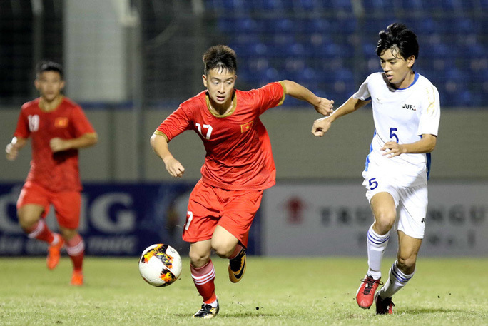  
Các cầu thủ U21 tuyển chọn Việt Nam bảo vệ thành công chức vô địch. Ảnh: Khả Hòa