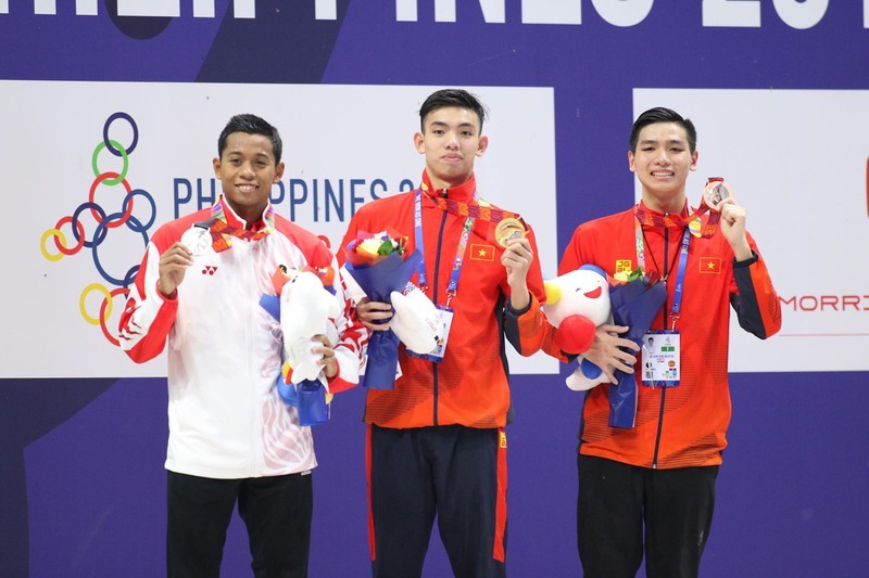  
Nguyễn Huy Hoàng và đàn em Nguyễn Hữu Kim Sơn vượt chuẩn Olympic Tokyo.