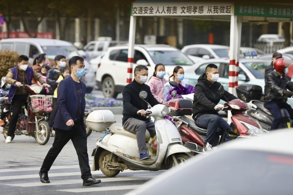  
Đường phố tại một tỉnh thành ở Hồ Bắc đã bắt đầu nhộn nhịp trở lại. (Ảnh: China Daily). 