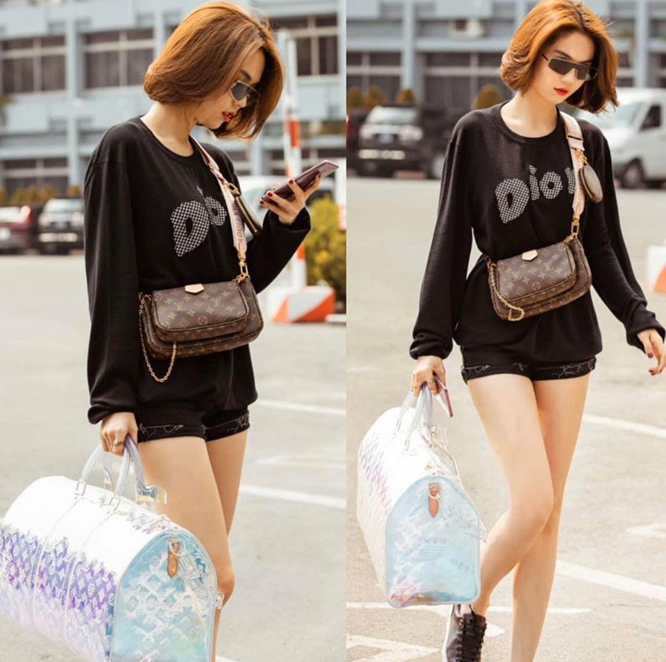  
Thời trang "đi sân bay" của cô nàng cũng khiến cho nhiều mê mẩn vì loạt đồ hiệu xa hoa. (Ảnh: Instagram NV)