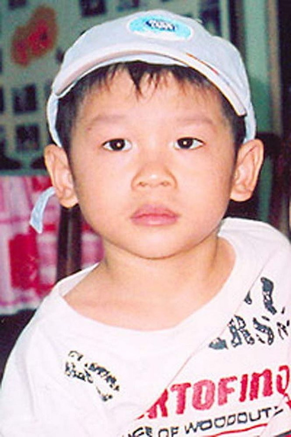  
Cậu bé Phạm Quang Sáng khi còn nhỏ. (Ảnh: VnExpress)