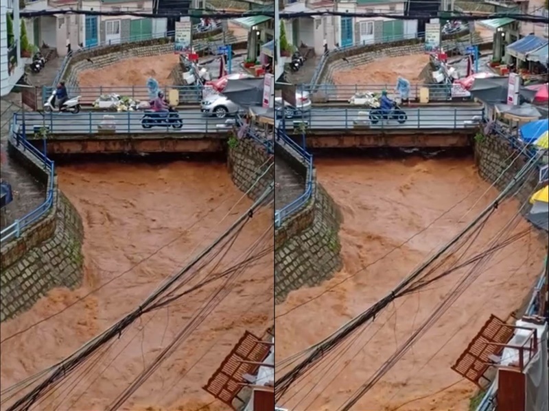  
Nước lũ chảy xối xả sau cơn mưa lớn ở Đà Lạt (Ảnh chụp màn hình)