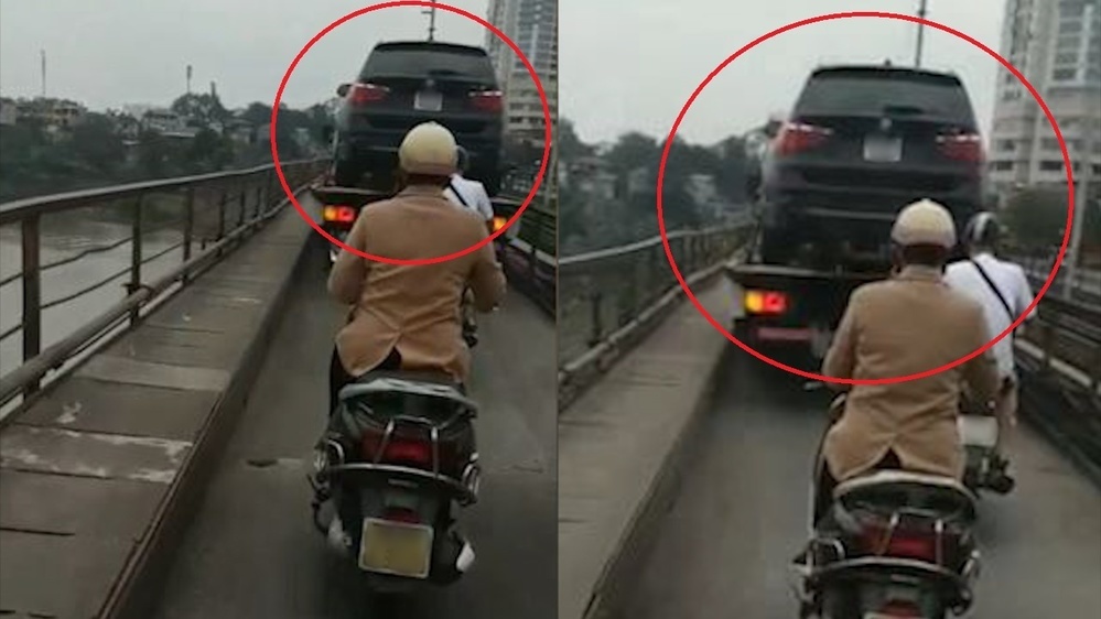  
Xe cứu hộ chở theo ô tô khác đi qua cầu Long Biên hồi tháng 2/2020 (Ảnh: Zing)