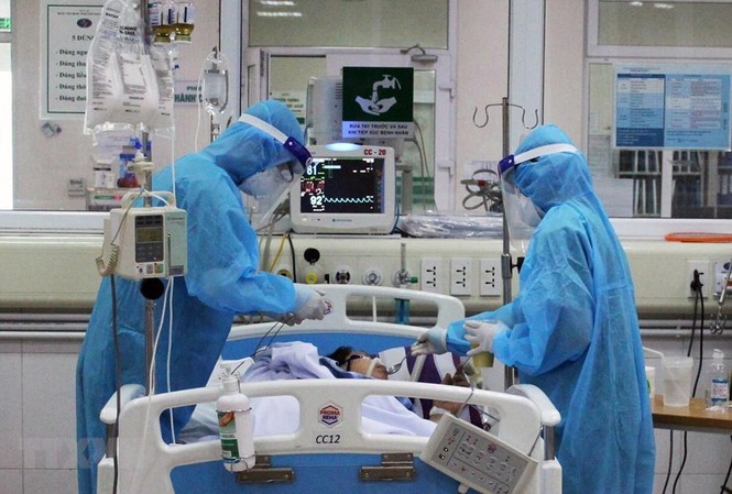  
Công tác chữa trị bệnh nhân nhiễm nCoV tại Việt Nam. (Ảnh: Tiền Phong)