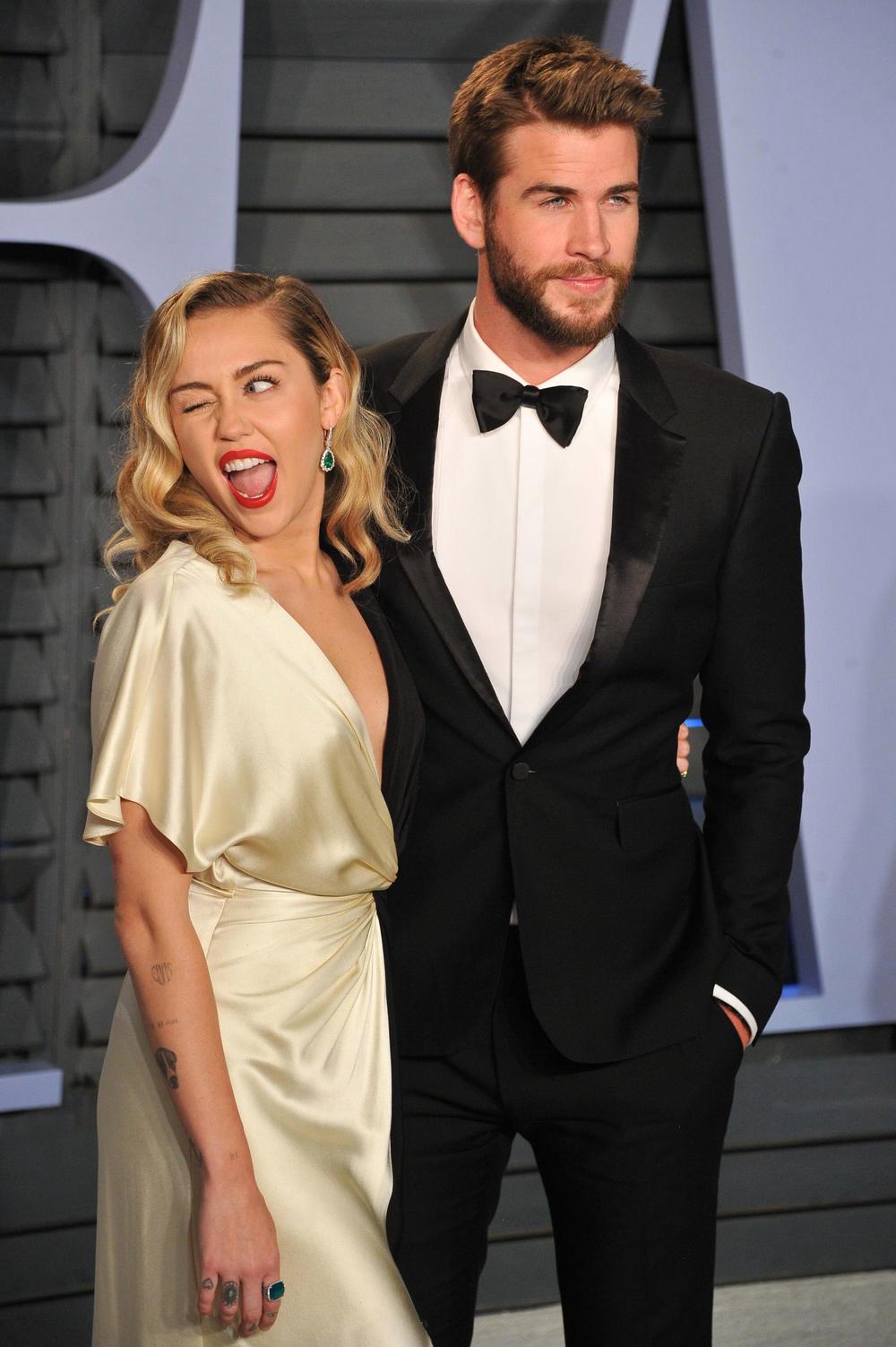  
Miley Cyrus và Liam Hemsworth kết hôn rồi chia tay trong chóng vánh. (Ảnh: The Sun)