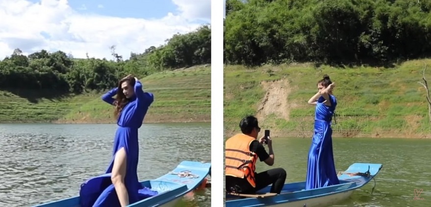  
Cặp sao cùng diện mẫu váy xanh coban dài, tạo dáng trên thuyền chông chênh. (Ảnh: Chụp màn hình)