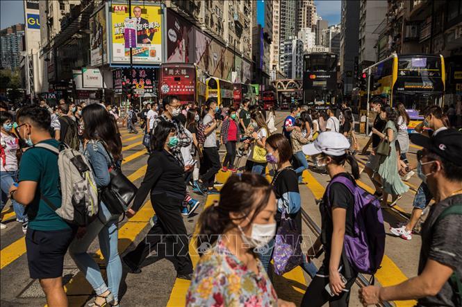  
Hong Kong, Nhật Bản, Hàn Quốc đều dự báo sẽ đón làn sóng bùng phát mới. Ảnh: TTXVN