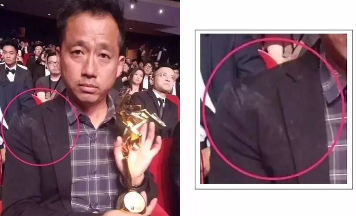  
Lớp phấn trên người của Phạm Băng Băng dính lên áo của người đàn ông. Ảnh: Weibo