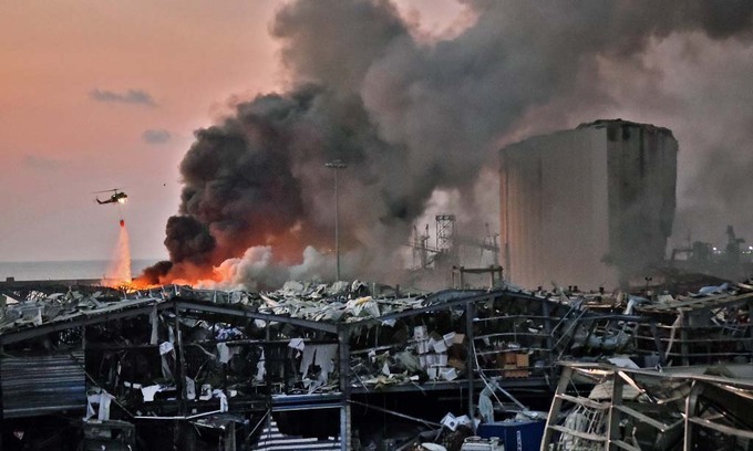  
Hiện trường tan hoang sau vụ nổ ở Lebanon. (Ảnh: AFP)