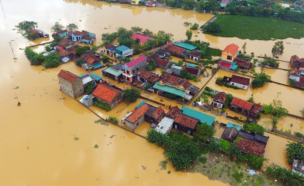  
Một khu vực ở Việt Nam bị ngập nặng do mưa bão. (Ảnh: Nhân Dân)