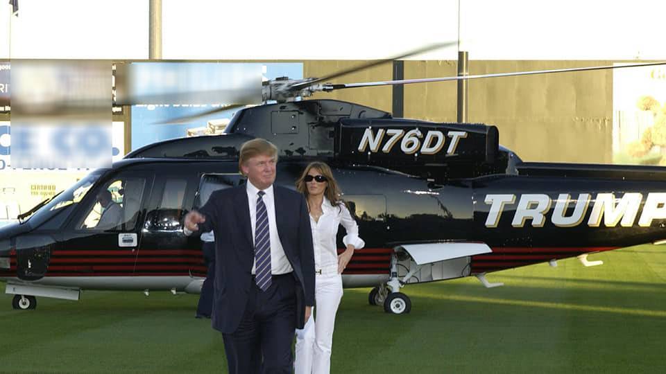  
Vợ chồng ông Trump bên chiếc trực thăng. (Ảnh: Forbes).