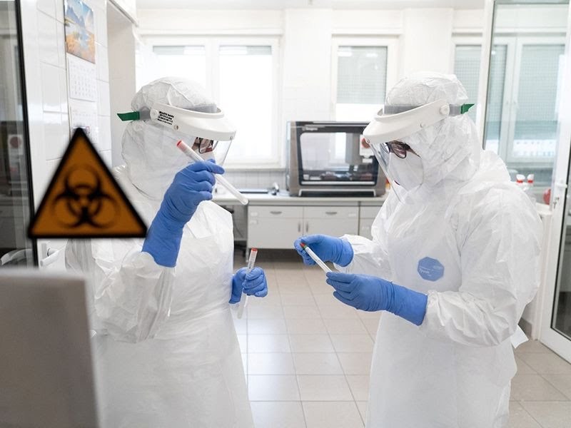 Nhân viên y tế đang nỗ lực ngày đêm tìm ra cách ngăn chặn virus SARS-CoV-2 (Ảnh: Báo tin tức)