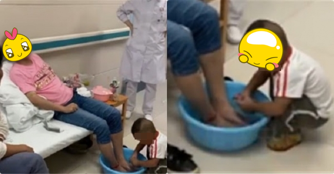  
Em bé đáng thương cẩn thận rửa chân cho mẹ (Nguồn: Sohu)