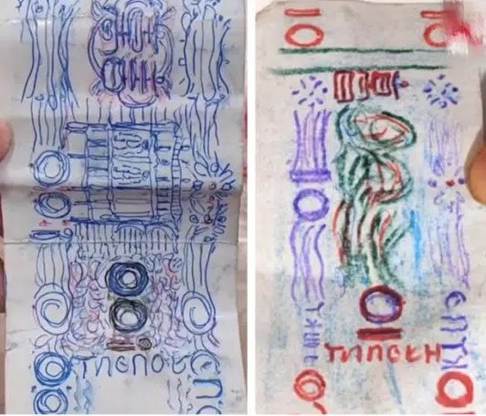  
Những tờ tiền "vẽ tay" được ông cụ vô gia cư dùng để mua mì suốt 7 năm. (Ảnh: ETToday)