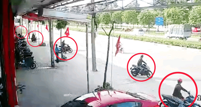  
5 đối tượng dàn cảnh trộm xe được ghi lại từ camera an ninh. (Ảnh: Cắt từ clip).