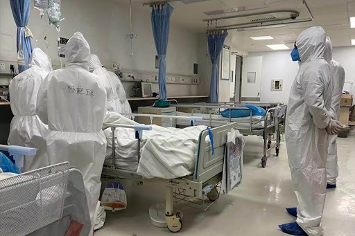  
Một ca mắc Covid-19 được điều trị tại bệnh viện ở Trung Quốc. (Ảnh: China Daily).