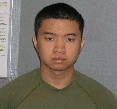  
Christopher Quang Võ là thành viên tổ chức hacker lớn tại Mỹ, hình ảnh được chụp khi bị bắt giữ. (Ảnh: NYTimes)