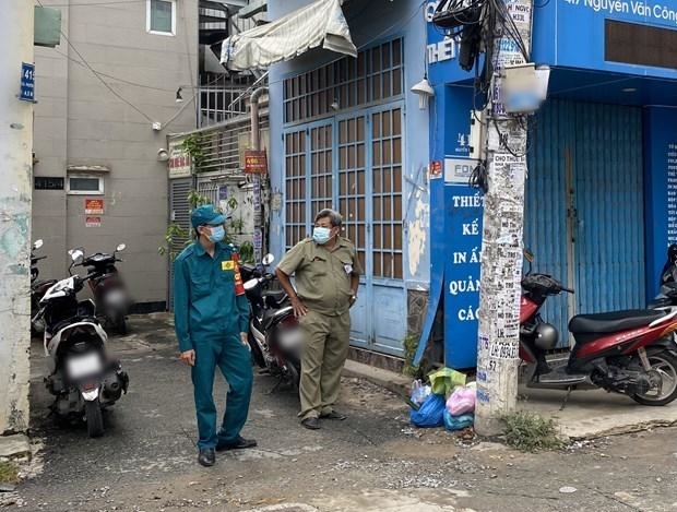  
Hẻm 415 Nguyễn Văn Công (phường 3, quận Gò Vấp, Thành phố Hồ Chí Minh) bị phong tỏa. (Ảnh: VTV)